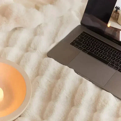 Kuchelige Kunstfell-Kuscheldecke