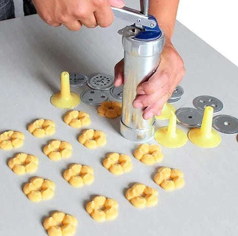 Kekspresse aus Edelstahl mit Aufsätzen für kreative Plätzchen und Gebäck
